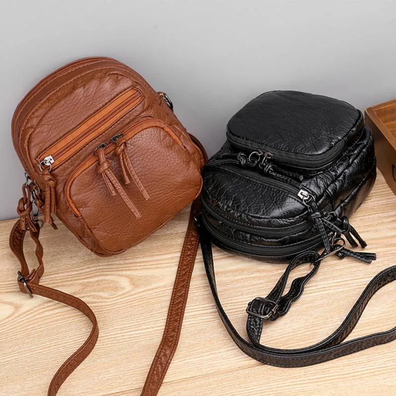 Izzy - Stilvolle Schultertasche mit verstellbarem Riemen