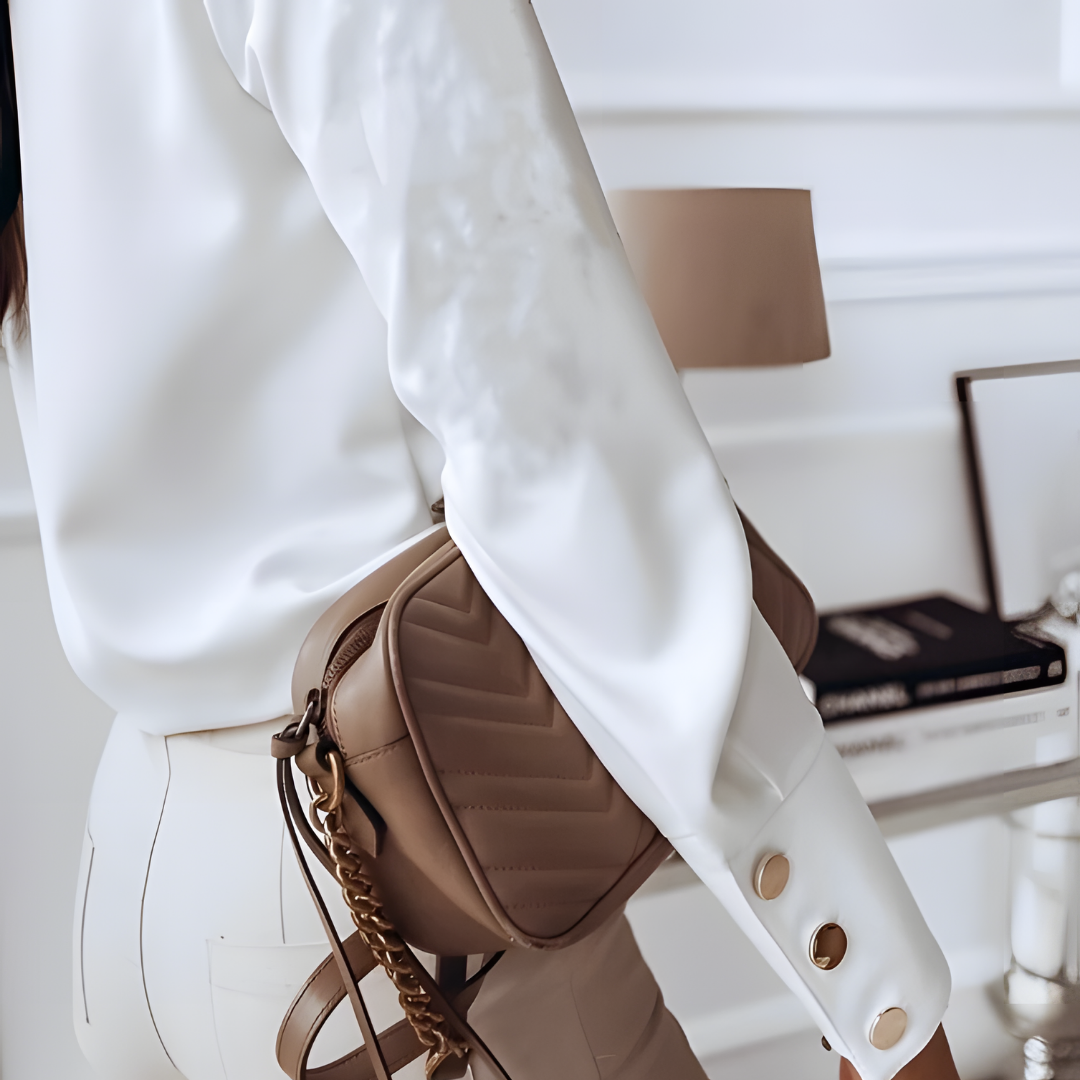 Eline - Blusa elegante con botonadura oculta