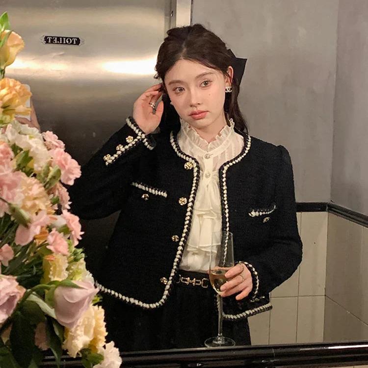 Lena – Blazer de tweed con escote redondo