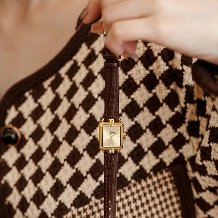 Svana - Elegante goldene Quarzarmbanduhr