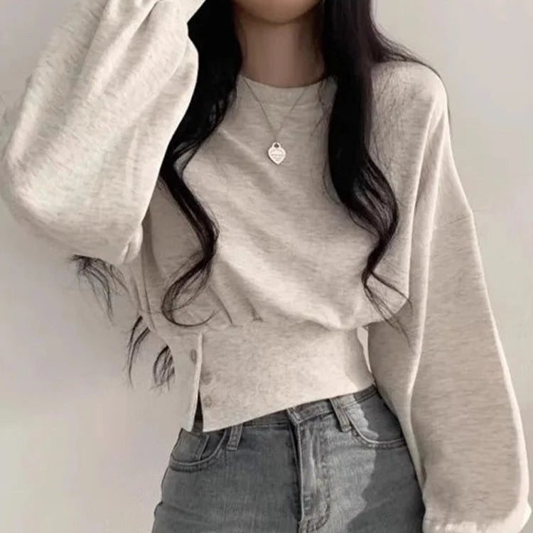 Luisa – Sudadera relajada con cinturón y detalle de botón