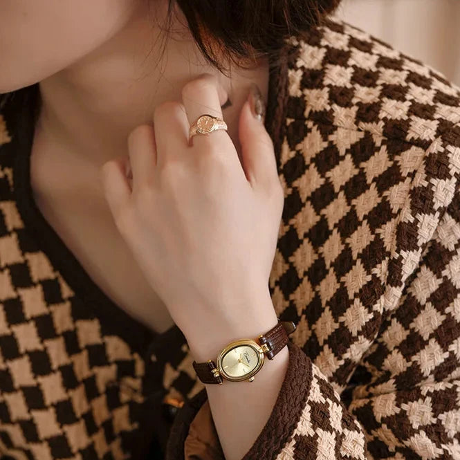 Svana - Elegante goldene Quarzarmbanduhr