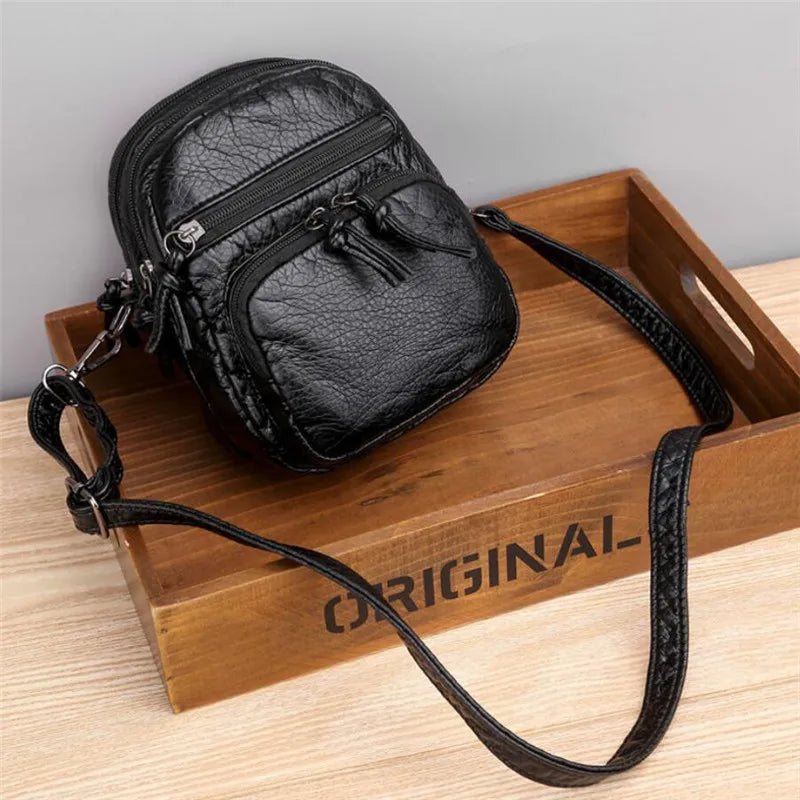 Izzy - Bolso de hombro elegante con correa ajustable