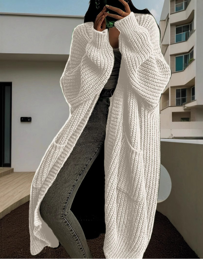 Caroline – Grovstrikket oversized cardigan med rå kant