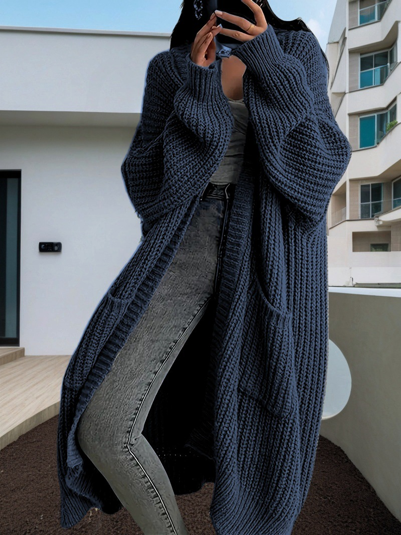 Caroline – Grovstrikket oversized cardigan med rå kant