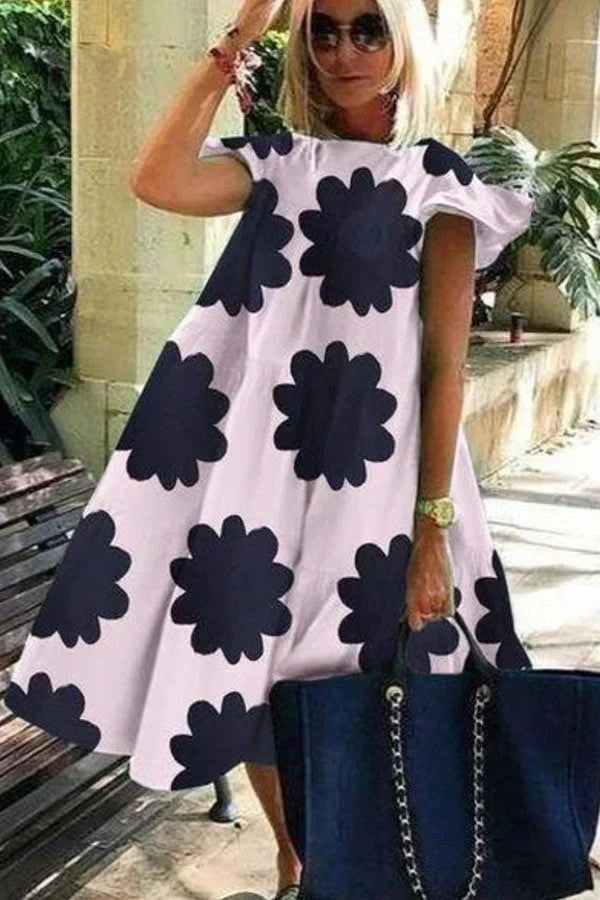 Brunhilde - Vestido corto con volantes y estampado floral de manga corta