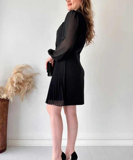 Amalia - Elegante vestido plisado con mangas abullonadas de longitud hasta la rodilla