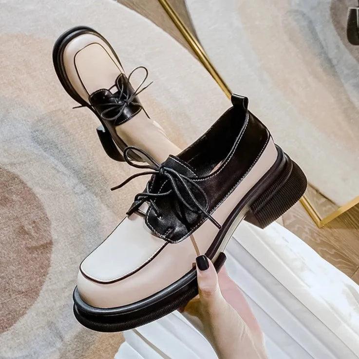 Stella - Mocasines bicolor con cordones y punta redonda