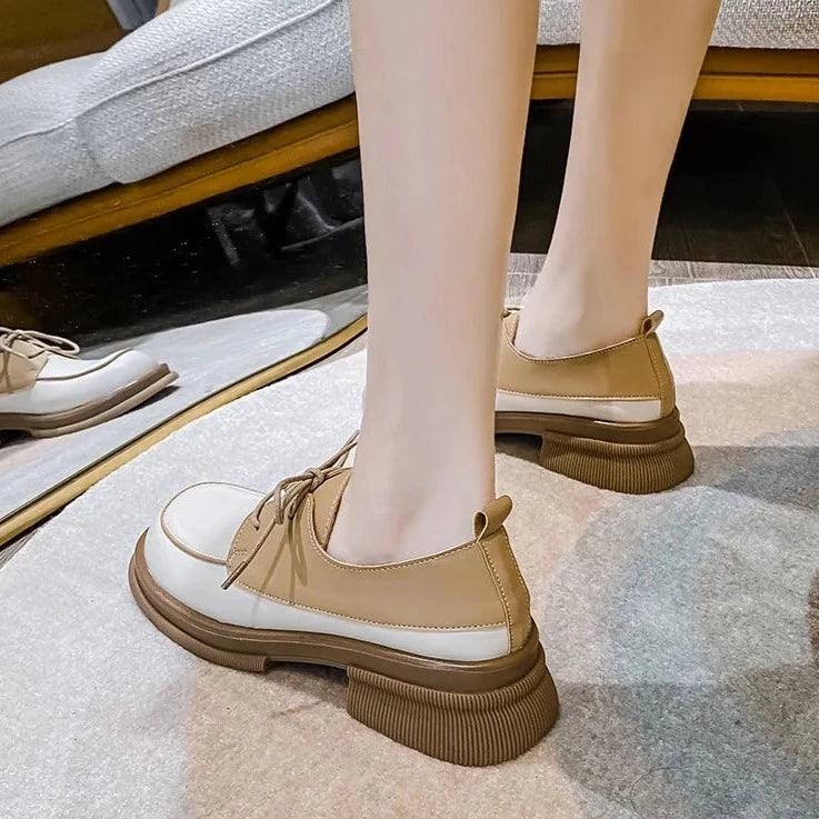 Stella - Mocasines bicolor con cordones y punta redonda