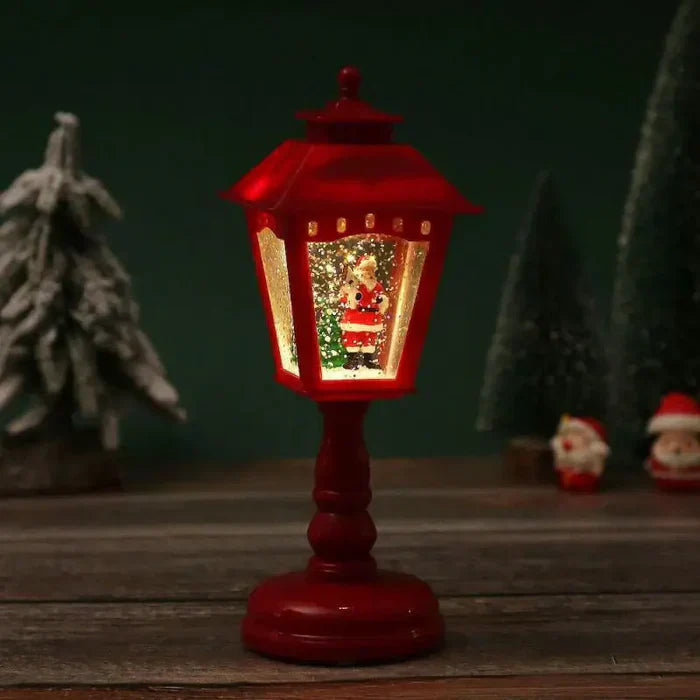 Glitzernde Weihnachts-Schneelaterne mit Licht
