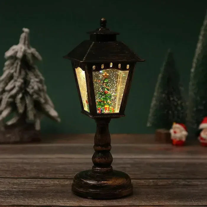 Glitzernde Weihnachts-Schneelaterne mit Licht