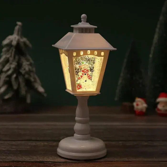 Glitzernde Weihnachts-Schneelaterne mit Licht