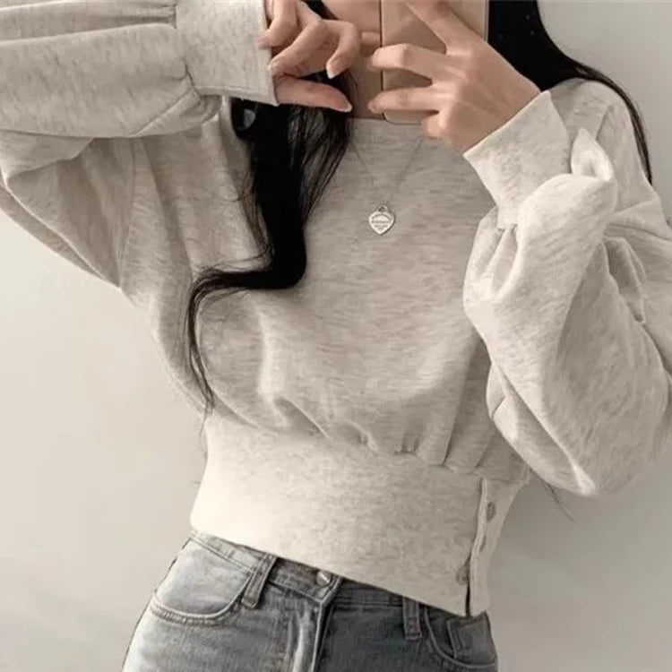 Luisa – Entspanntes Sweatshirt mit Gürtel und Knopfdetail