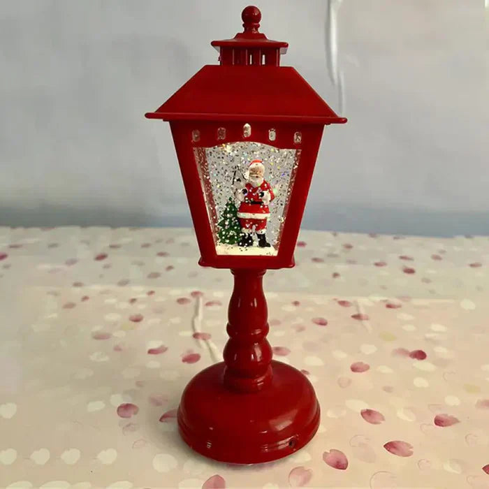 Glitzernde Weihnachts-Schneelaterne mit Licht