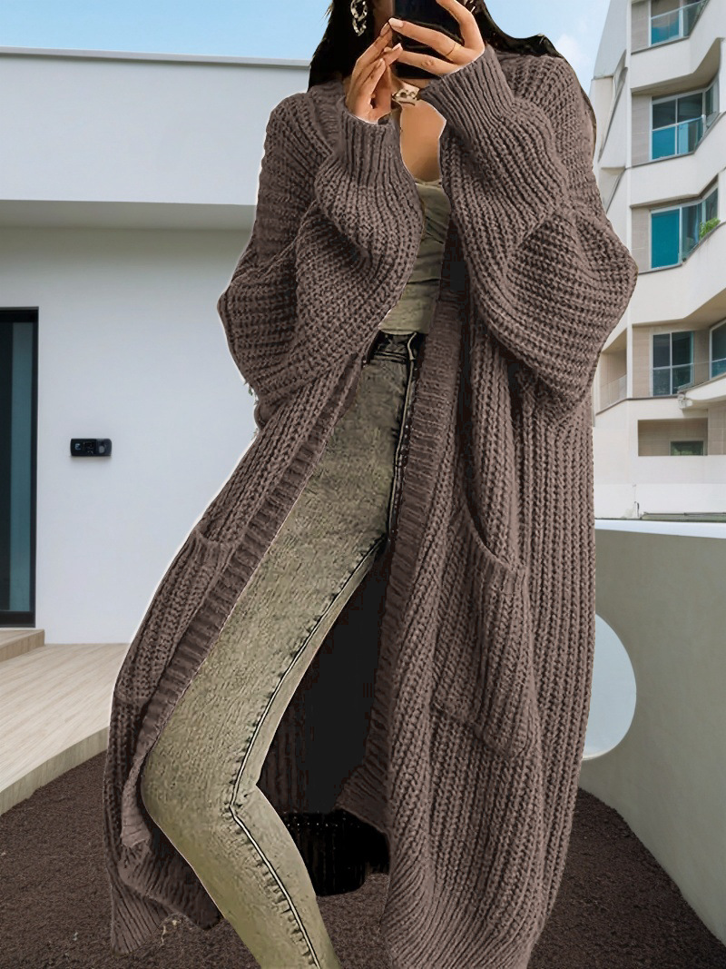 Caroline – Grovstrikket oversized cardigan med rå kant