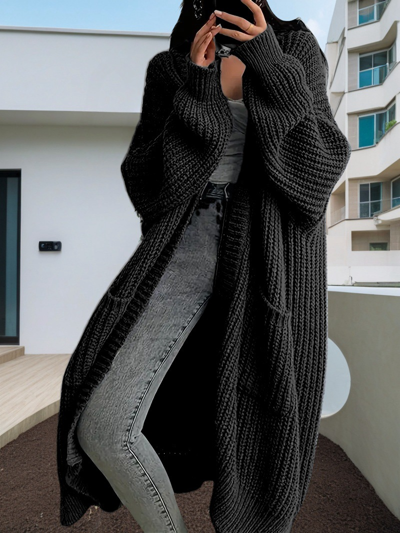 Caroline – Grovstrikket oversized cardigan med rå kant